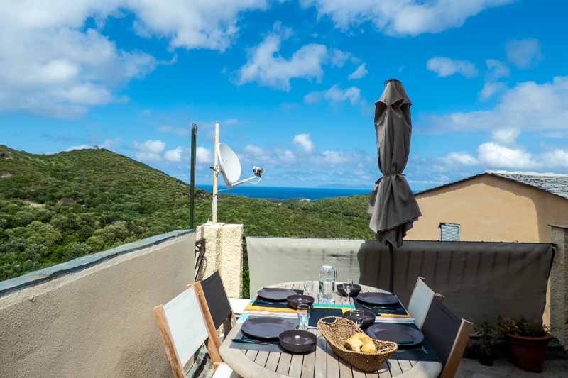 Maison de village confortable et agréable, avec terrasse et vue mer par Locations Cap Corse